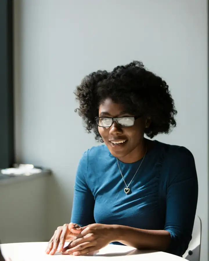 Professional participating in a one-to-one workplace conversation